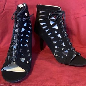 New pair of peak a boo black sandals made by Avon. These size 9.